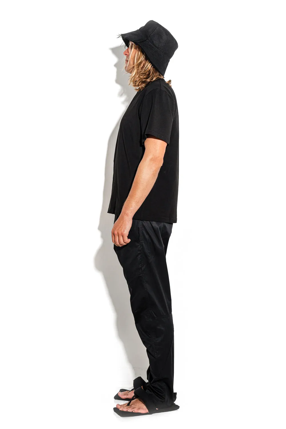 Black T-shirt with a geometric seam