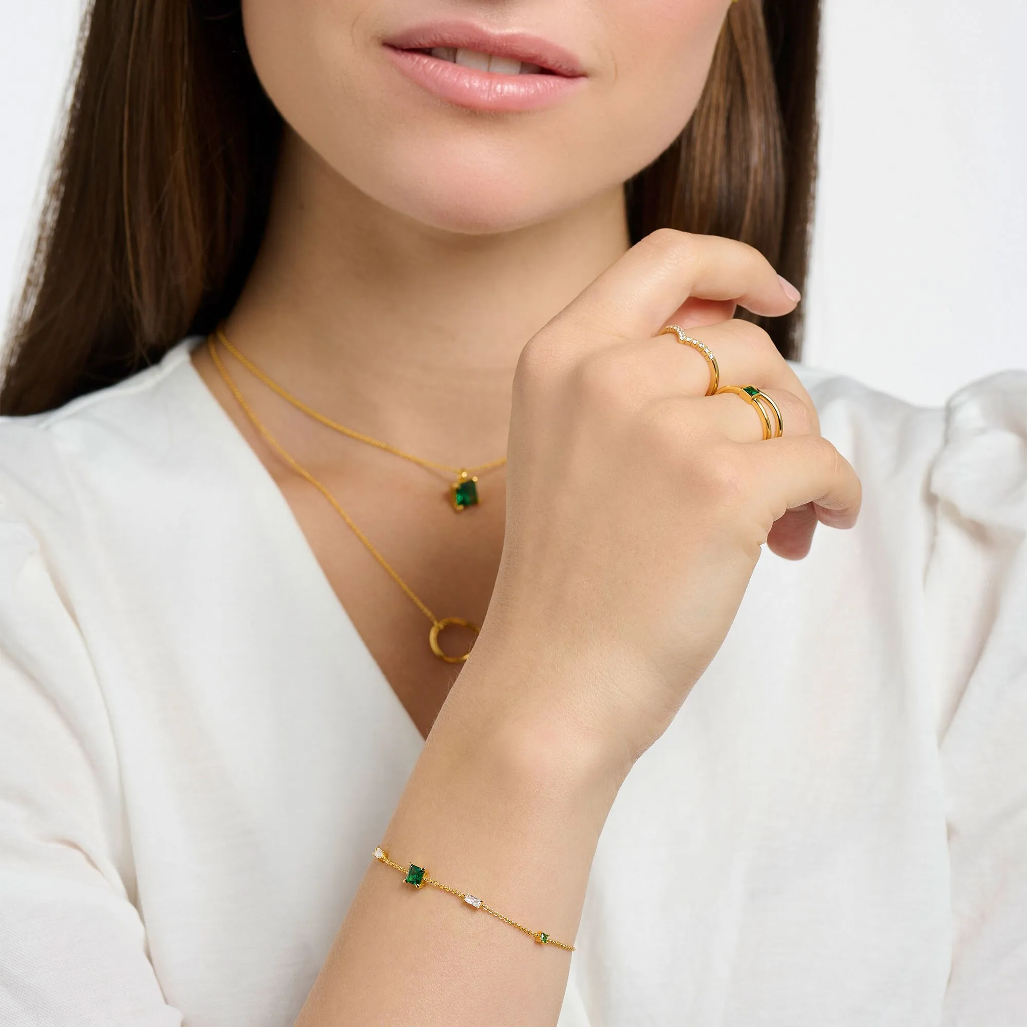 Bracelet with green and white stones gold